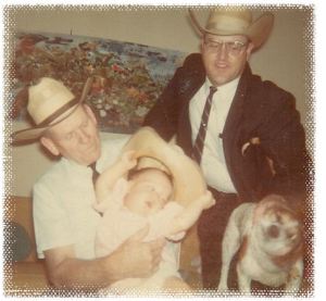 My Granddady is holding me. Polly is in front of my Daddy.