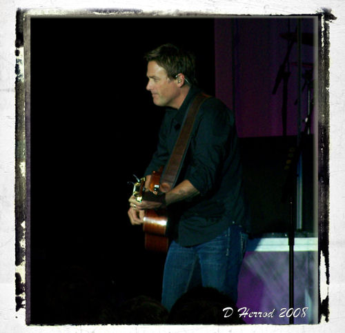 Smitty is known for being a keyboardist but he can also play the guitar.