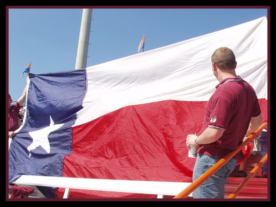 Displaying a very large Lone Star (Texas) flag.