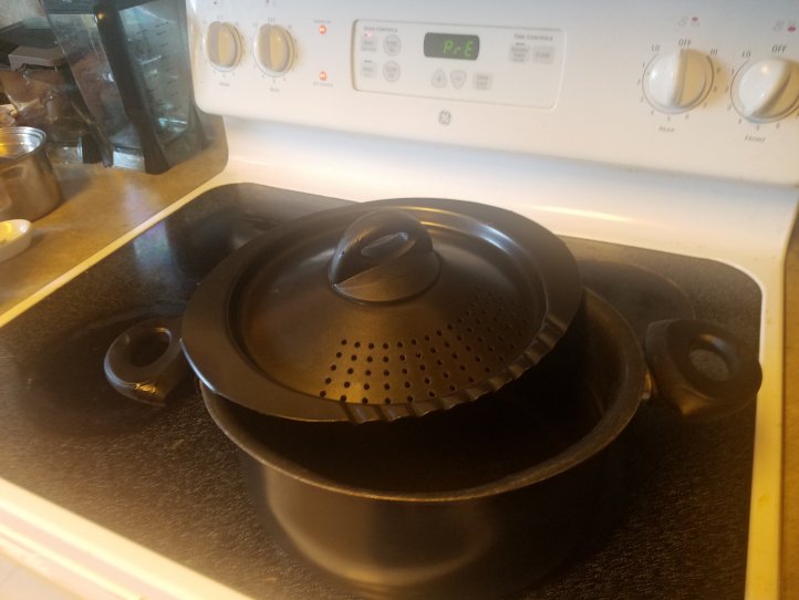 Water boiling in pasta pan.