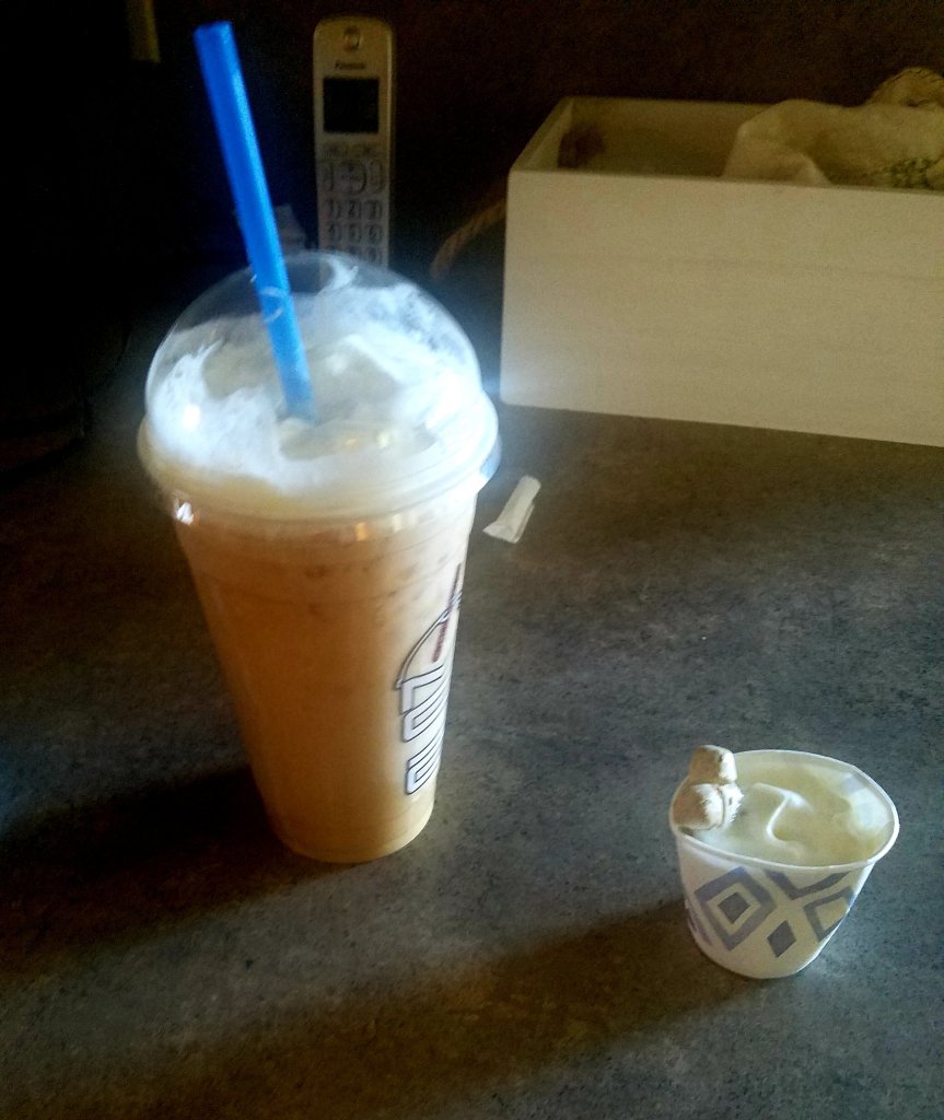 The Big Guys smoothie is in a huge cup with a lot of whip. My pupachino is in a small cup.